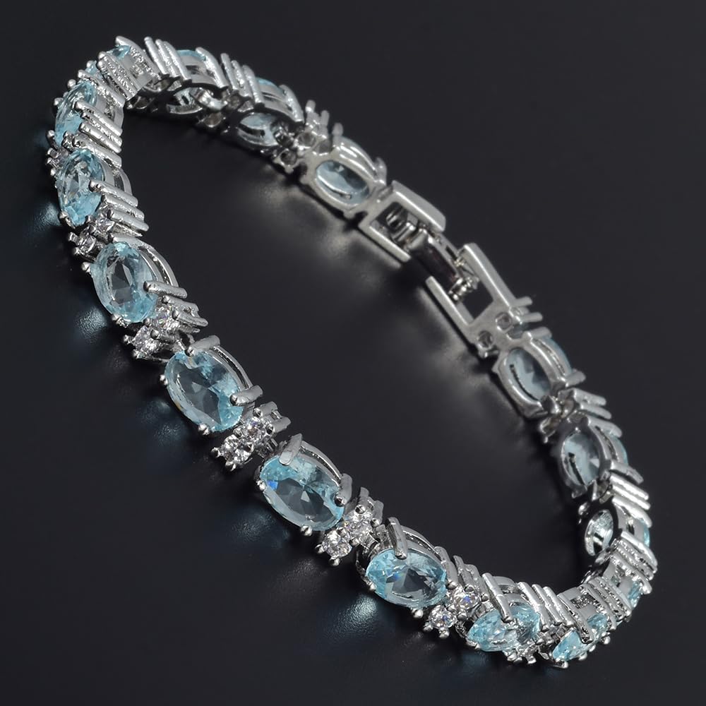 RIZILIA Oval Cut Multi-Color CZ Birthstone 18K White Gold Plated Tennis Bracelet, 7"