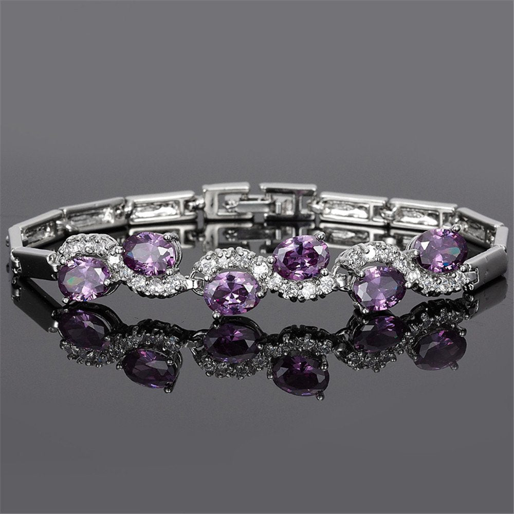 RIZILIA Tennis Bracelet & Oval Cut CZ [6 Colors available] in White Gold Plated, 7"