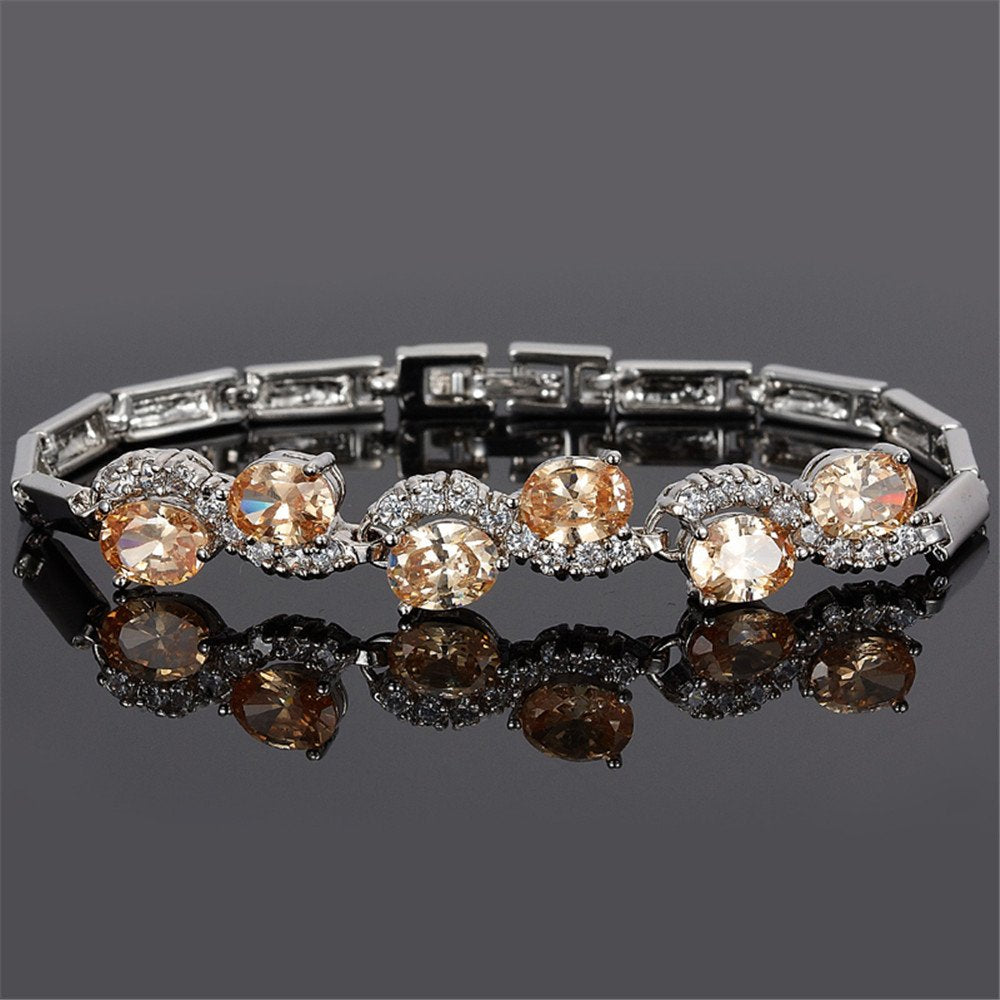 RIZILIA Tennis Bracelet & Oval Cut CZ [6 Colors available] in White Gold Plated, 7"