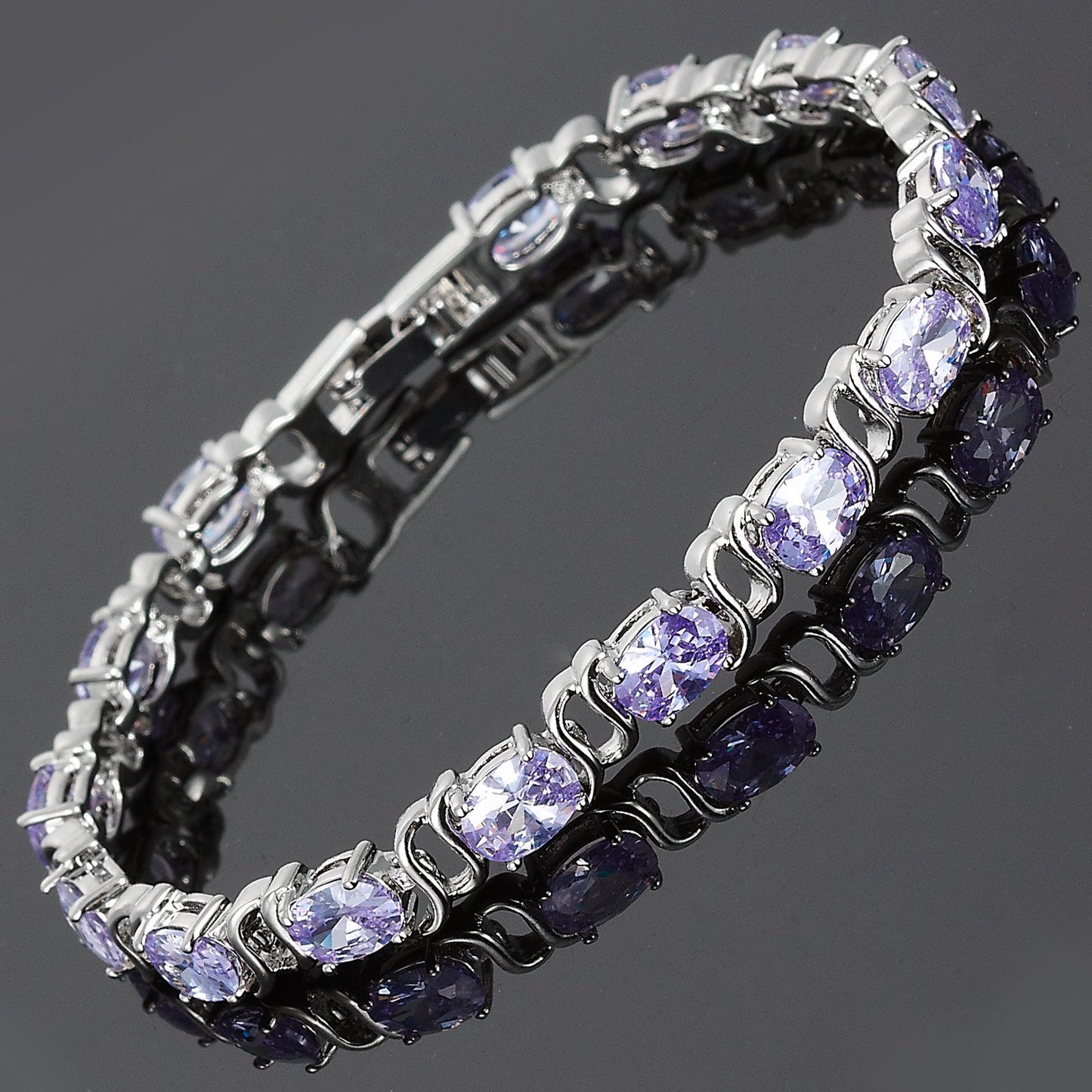 RIZILIA Oval Cut Multi-Color CZ 18K White Gold Plated Tennis Bracelet, 7"