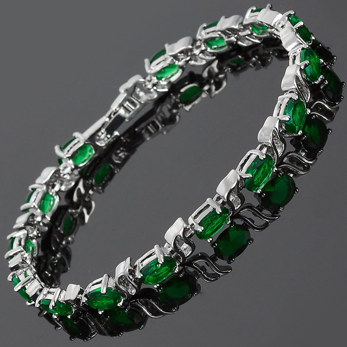 RIZILIA Oval Cut Multi-Color CZ 18K White Gold Plated Tennis Bracelet, 7"